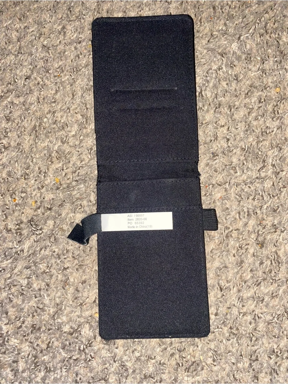 Black minimalist elastic and faux leather card holder